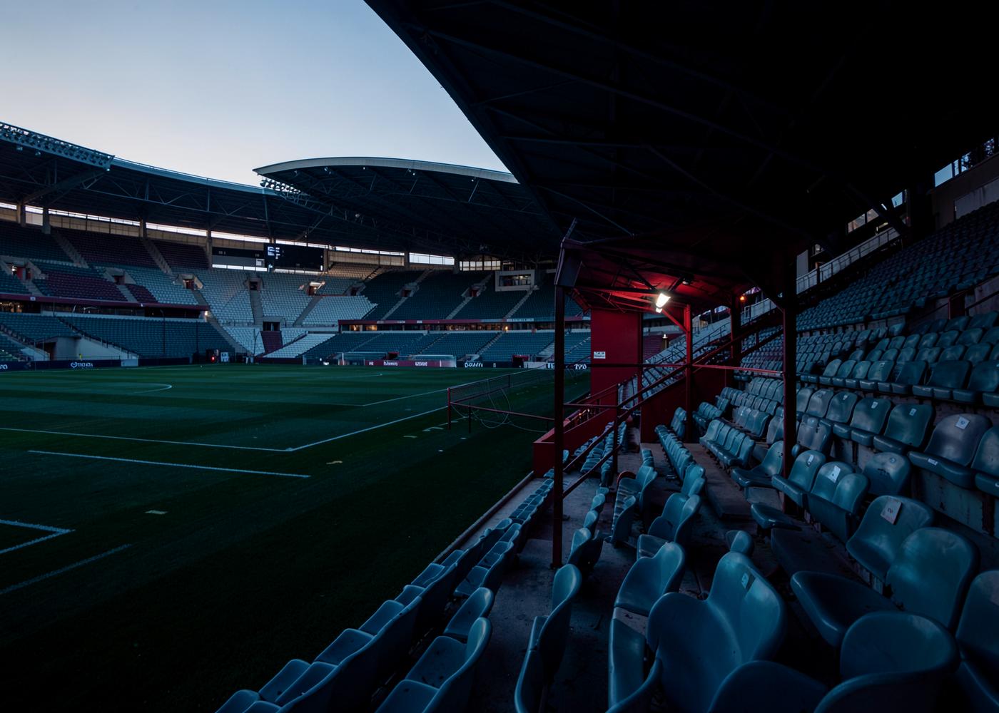 Empty football stadium at dawn